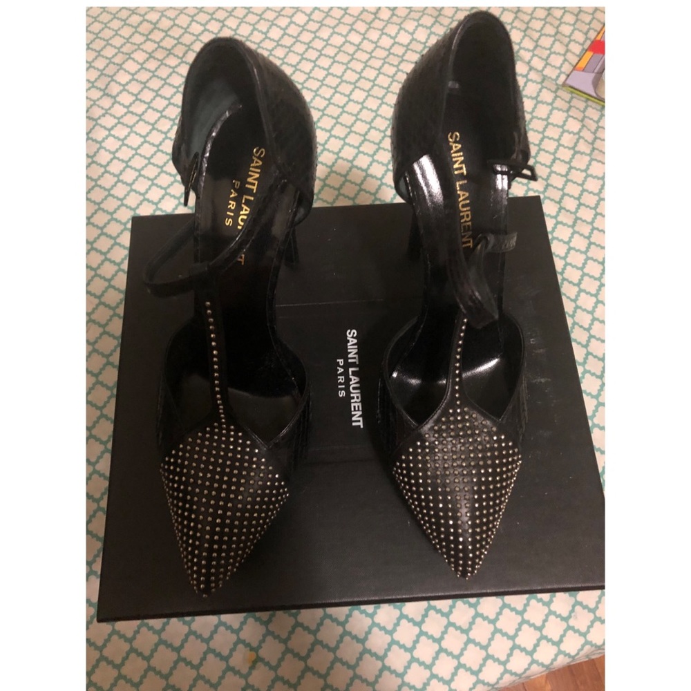 YSL black platform studs pumps heel is 5.5 inches.